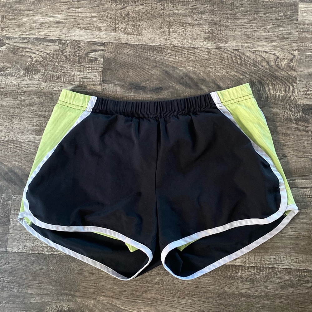 Black and green Aspire athletic shorts with shorts inside
